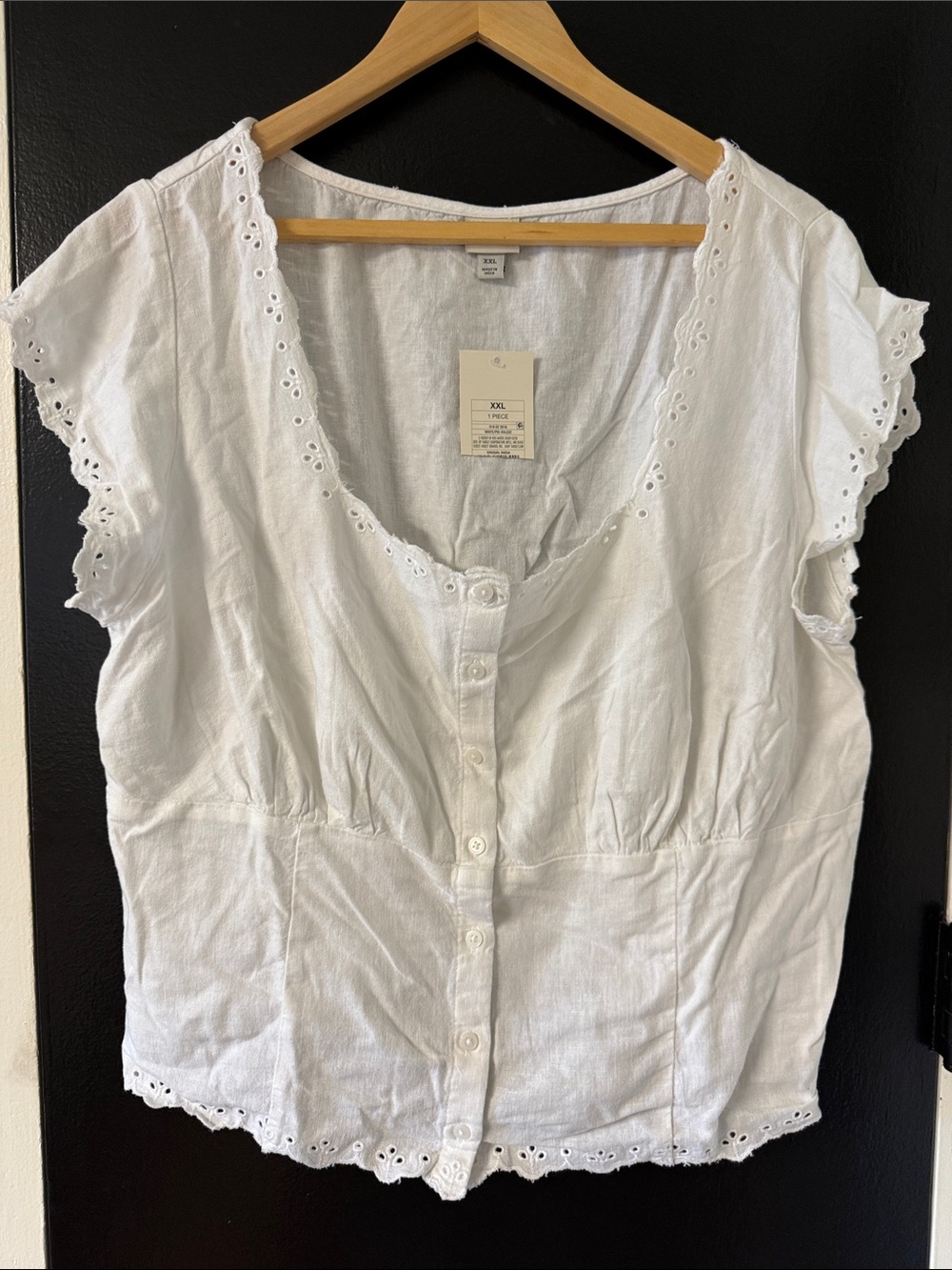 white short-sleeve button-front eyelet trim top from A New Day in size XXL.